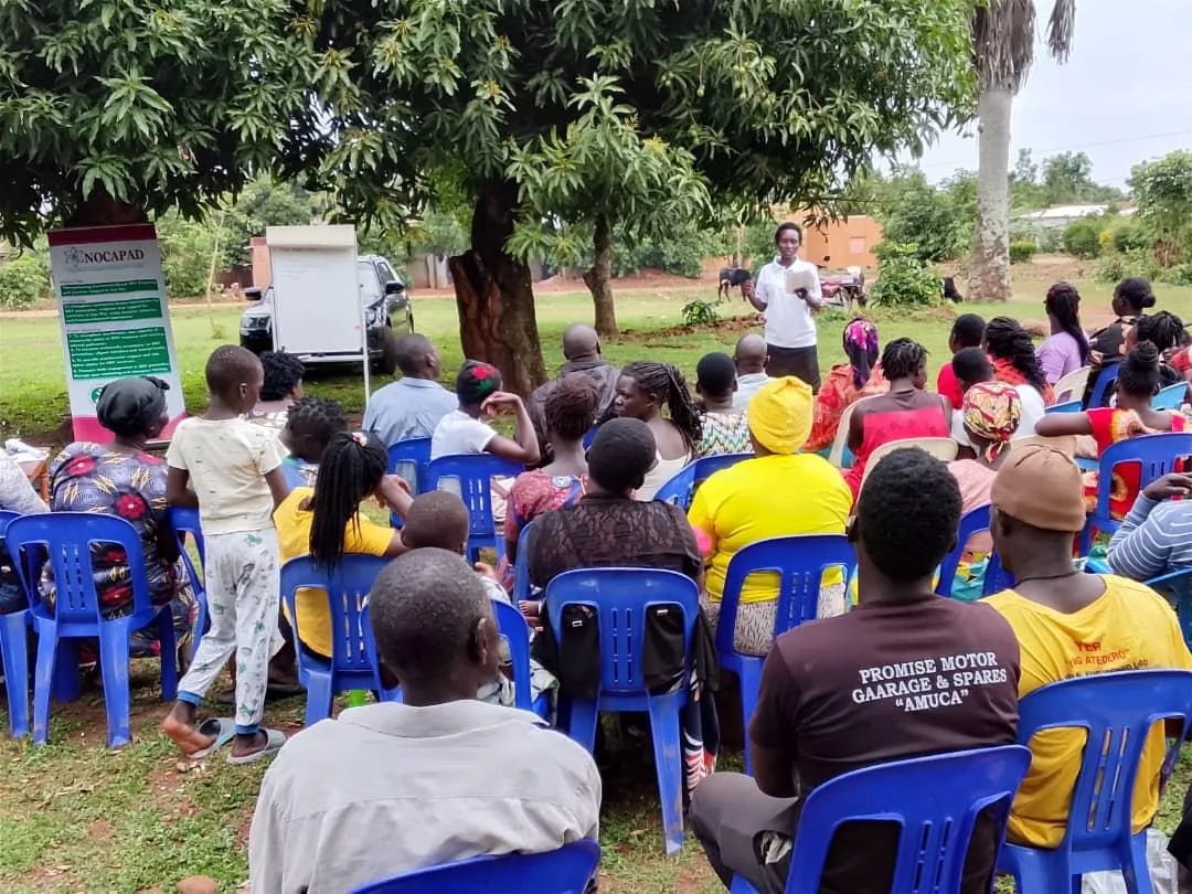 Community dialogue under the trees