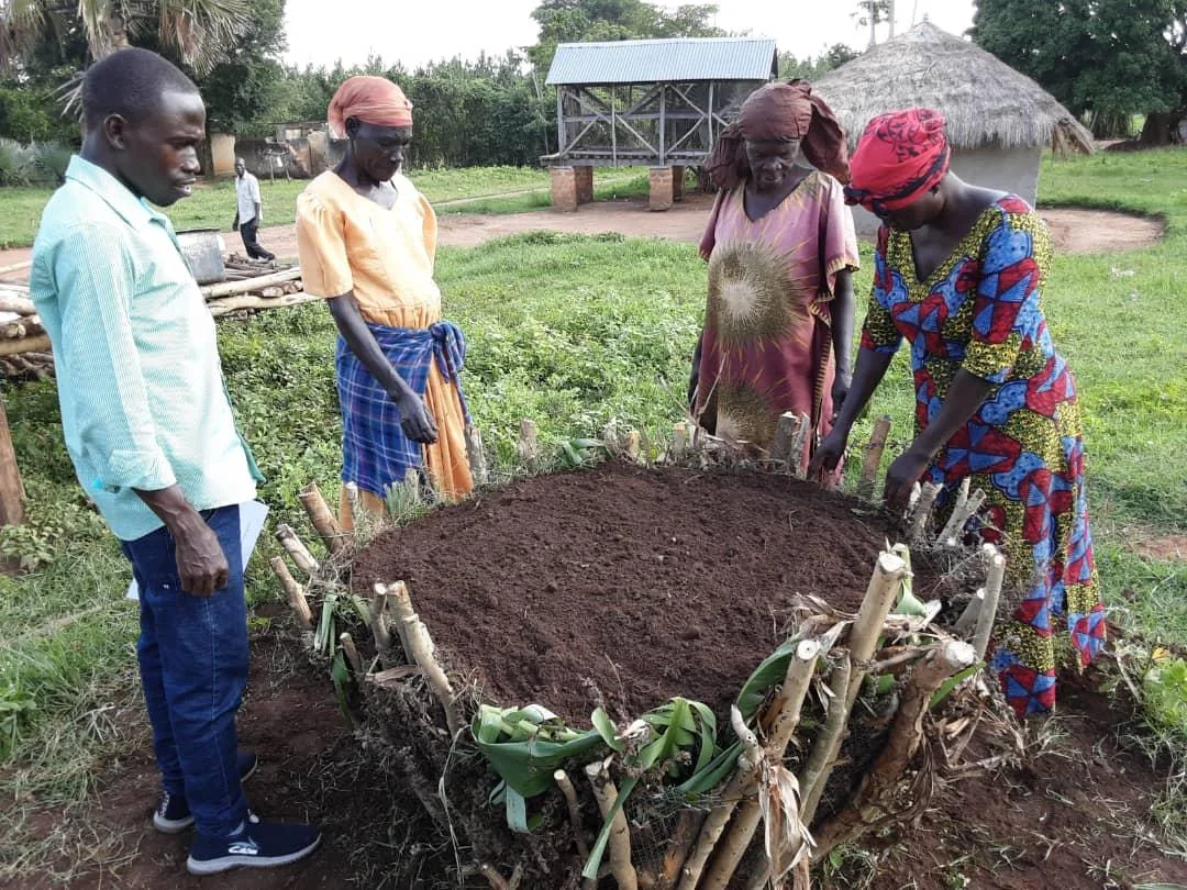 Community members work on sustainable agriculture